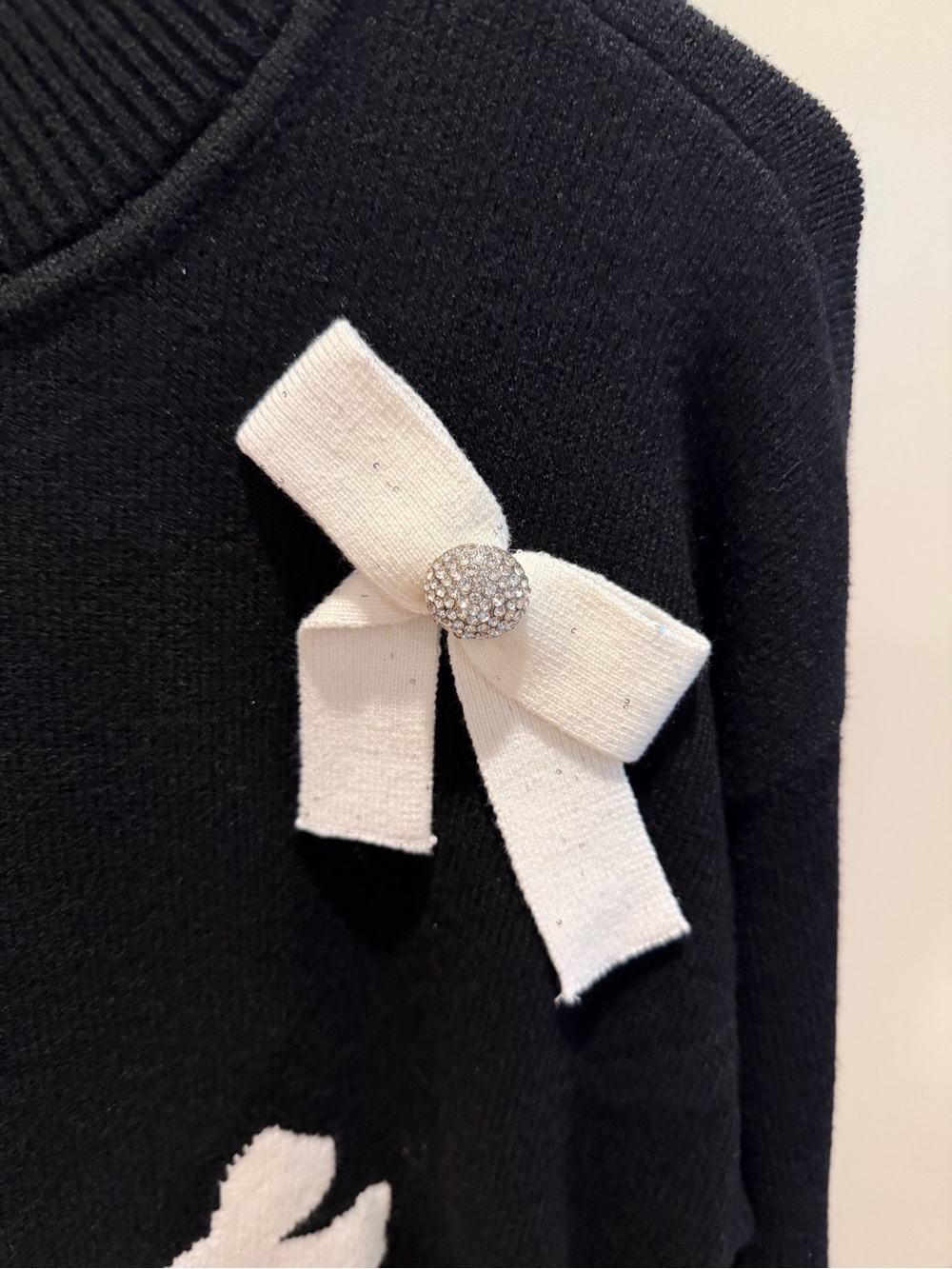 Karl Lagerfeld Black Sweater with White Bow Accents - Picture 2 of 9